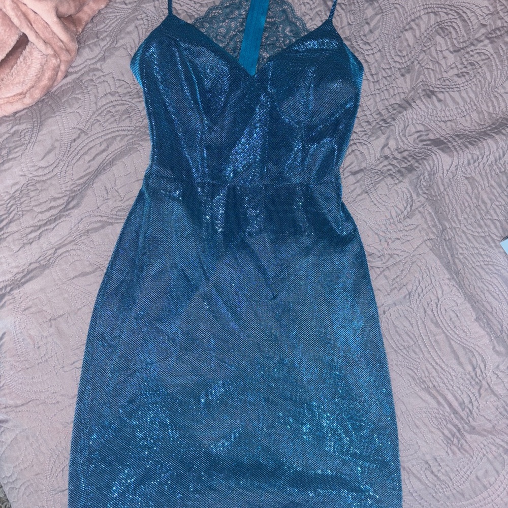 Elegant blue sparkly mini dress great for a social